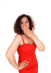 Image showing Shocked woman with hand over mouth.