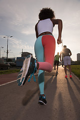 Image showing multiethnic group of people on the jogging