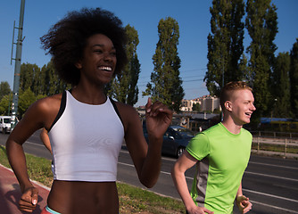 Image showing multiethnic group of people on the jogging