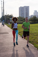 Image showing multiethnic group of people on the jogging