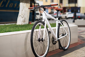 Image showing white fixed-gear bicycle on street