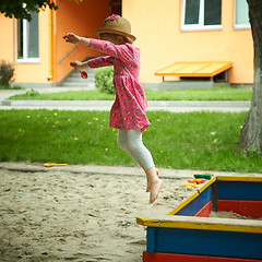 Image showing Child on playground in summer park