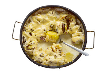 Image showing Ready dish of potatoes with bacon and cheese sauce