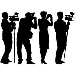 Image showing Cameraman with video camera. Silhouettes on white background. 