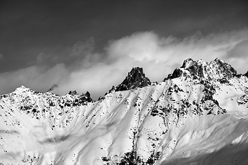 Image showing Black and white snow avalanches mountainside in clouds