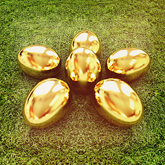 Image showing Gold Easter eggs as a flower on a green grass. 3D illustration. 