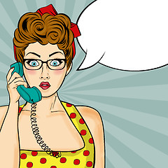 Image showing Pop art  woman chatting on retro phone . Comic woman with speech