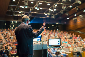 Image showing Public speaker giving talk at Business Event.