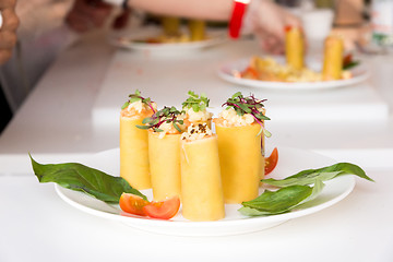 Image showing appetizer - cheese rolls with meat and vegetables