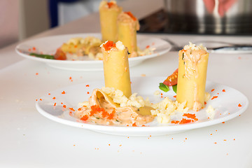 Image showing appetizer - cheese rolls with meat and vegetables