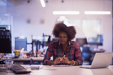 Image showing portrait of a young successful African-American woman in modern 