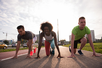 Image showing multiethnic group of people on the jogging