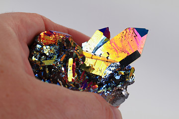 Image showing crystal with metal rainbow surface