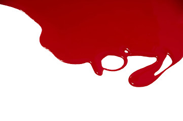 Image showing Red flowing paint