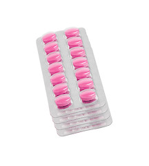 Image showing Pink tablet pills in blister