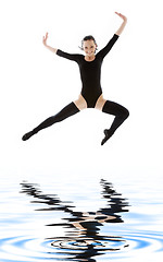 Image showing girl in black leotard jumping over water