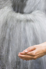 Image showing Hands scooping water