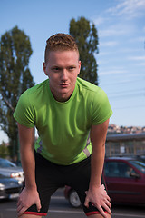 Image showing portrait of a young man on jogging