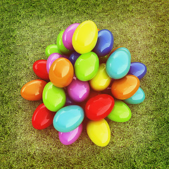 Image showing Colored Easter eggs on a green grass. 3D illustration. Vintage s