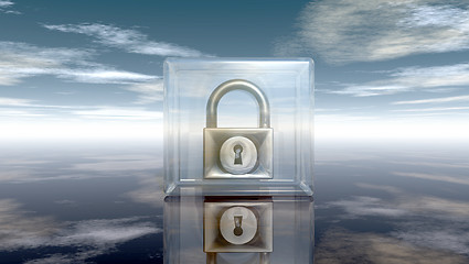 Image showing padlock in glass cube under cloudy sky - 3d illustration