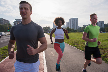 Image showing multiethnic group of people on the jogging