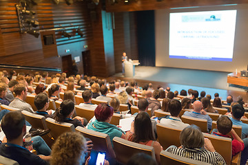 Image showing Business speaker giving a talk in conference hall.