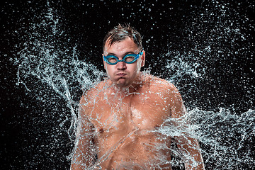 Image showing The water splash on male face