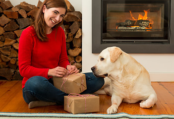 Image showing Wrapping presents for Christmas