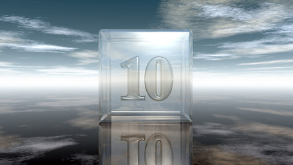 Image showing number ten in glass cube under cloudy sky - 3d rendering