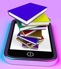 Image showing Mobile Phone With Books Stack Shows Online Knowledge