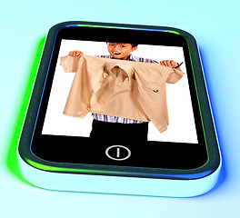 Image showing Mobile Photo Of Boy Checking Out His Purchases