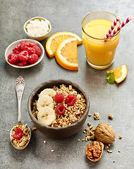 Image showing bowl of muesli with fresh berries and banana