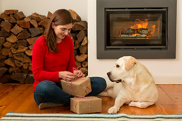 Image showing Wrapping presents for Christmas