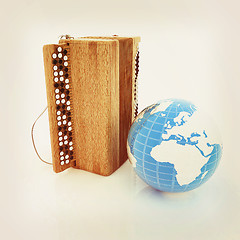 Image showing Musical instrument - retro bayan and Earth. 3D illustration. Vin