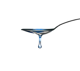 Image showing spoon with oil drop