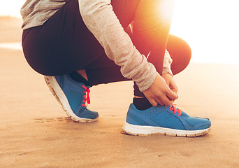 Image showing Tying the shoelaces