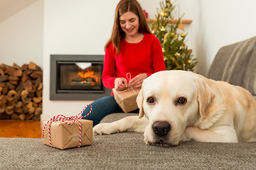 Image showing Wrapping presents for Christmas