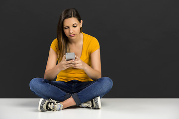 Image showing Girl with a smartphone