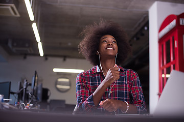 Image showing portrait of a young successful African-American woman in modern 