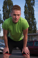 Image showing portrait of a young man on jogging