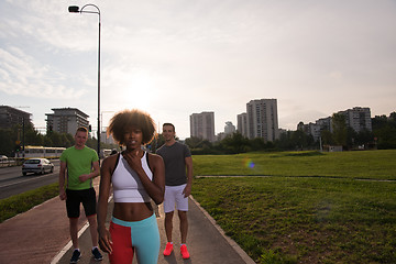 Image showing multiethnic group of people on the jogging