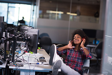 Image showing portrait of a young successful African-American woman in modern 