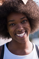 Image showing Close up portrait of a beautiful young african american woman sm