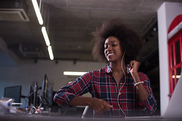 Image showing portrait of a young successful African-American woman in modern 