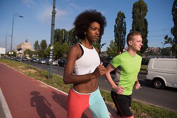 Image showing multiethnic group of people on the jogging