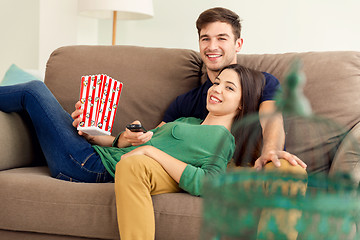 Image showing Popcorns and Sofa