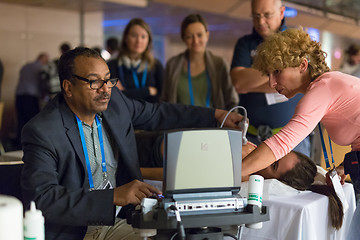 Image showing Participants learning new ultrasound techniques on medical congress.