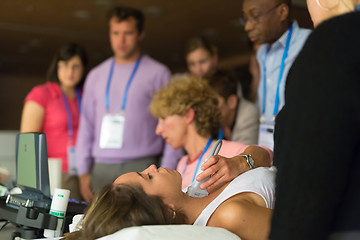 Image showing Participants learning new ultrasound techniques on medical congress.