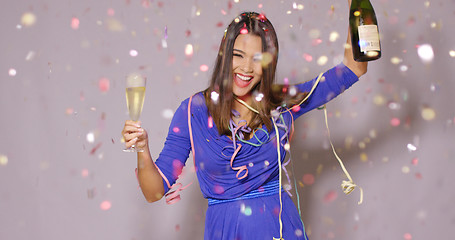 Image showing Giggling happy woman celebrating the New Year