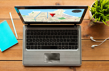Image showing close up of laptop computer with gps navigator map